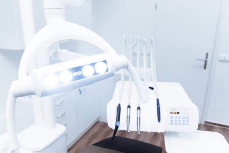 White Dental Equipment Near Wall