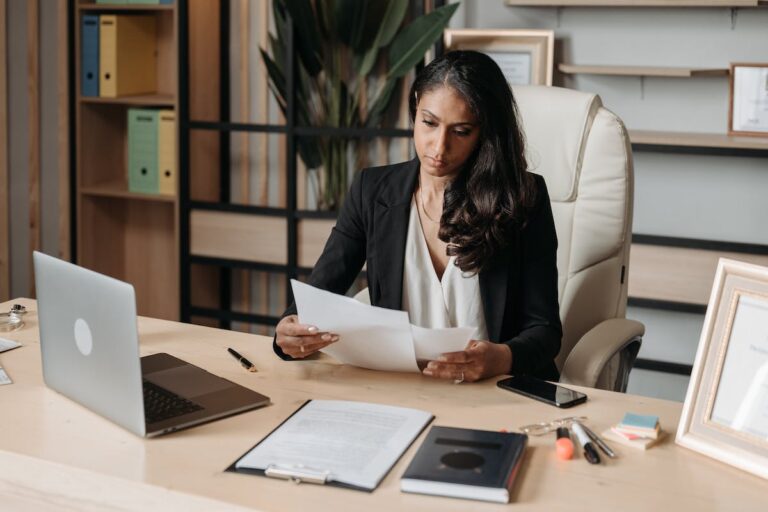 Woman Working at the Desk in Office